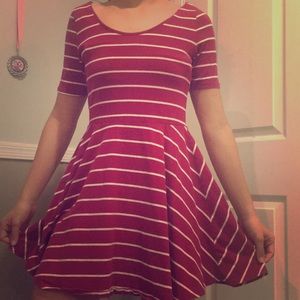 This is an elegant dress that is striped.
